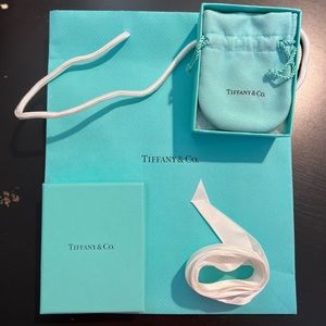 100% authentic and original Tiffany & Co box, pouch, ribbon and bag
